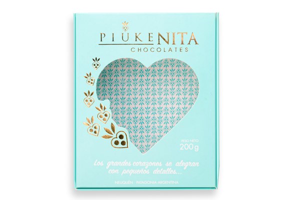 Caja impresa, con hot stamping dorado. Visor en acetato.